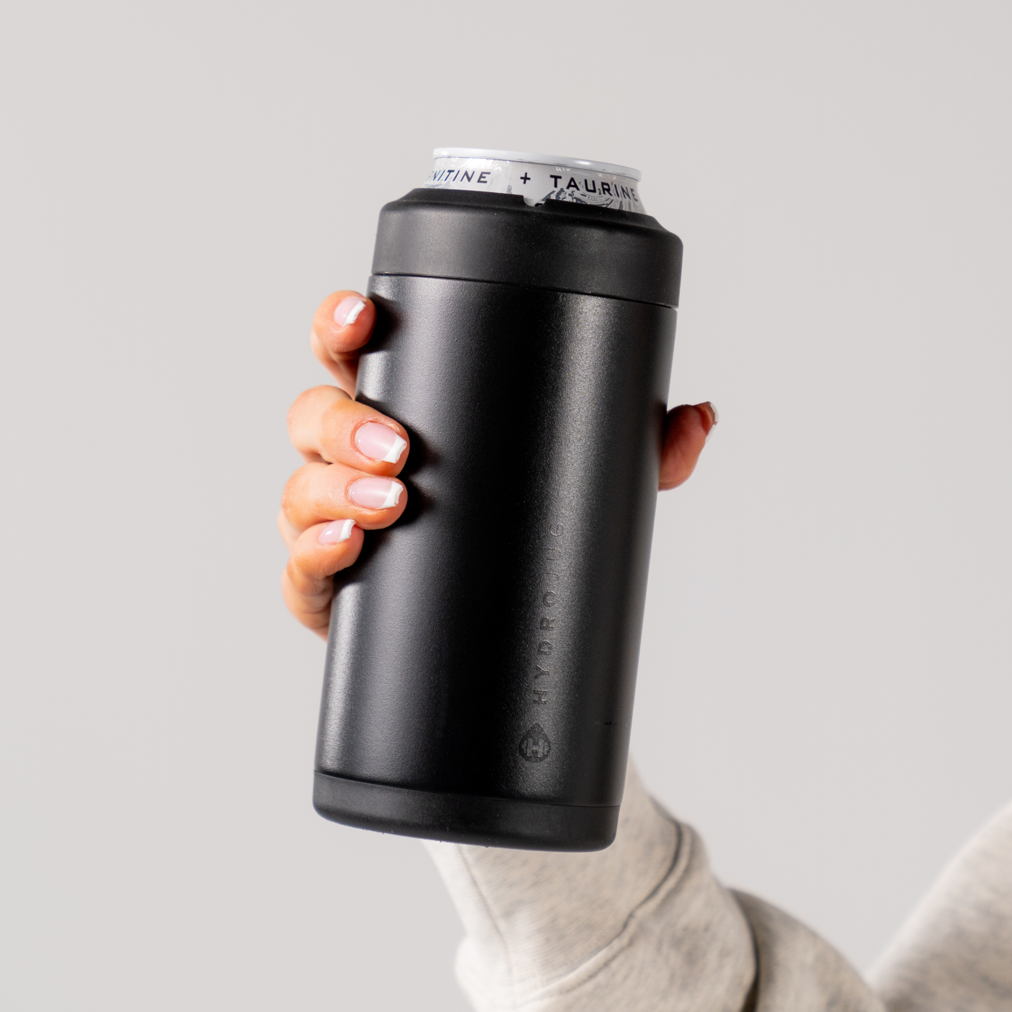 Hands Holding a HydroJug Black Can Cooler 16oz