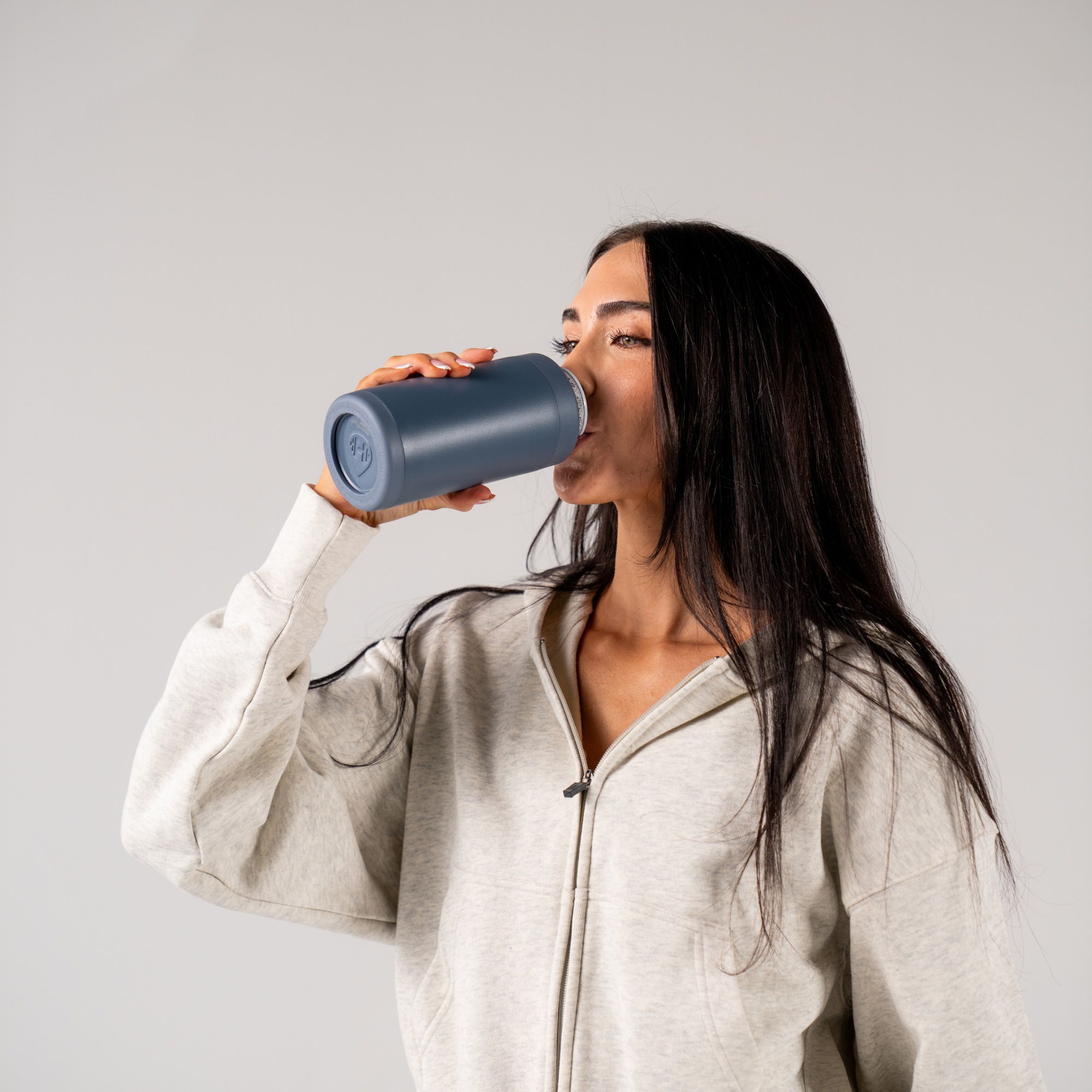 Woman Drinking from HydroJug Cascade Can Cooler 16oz