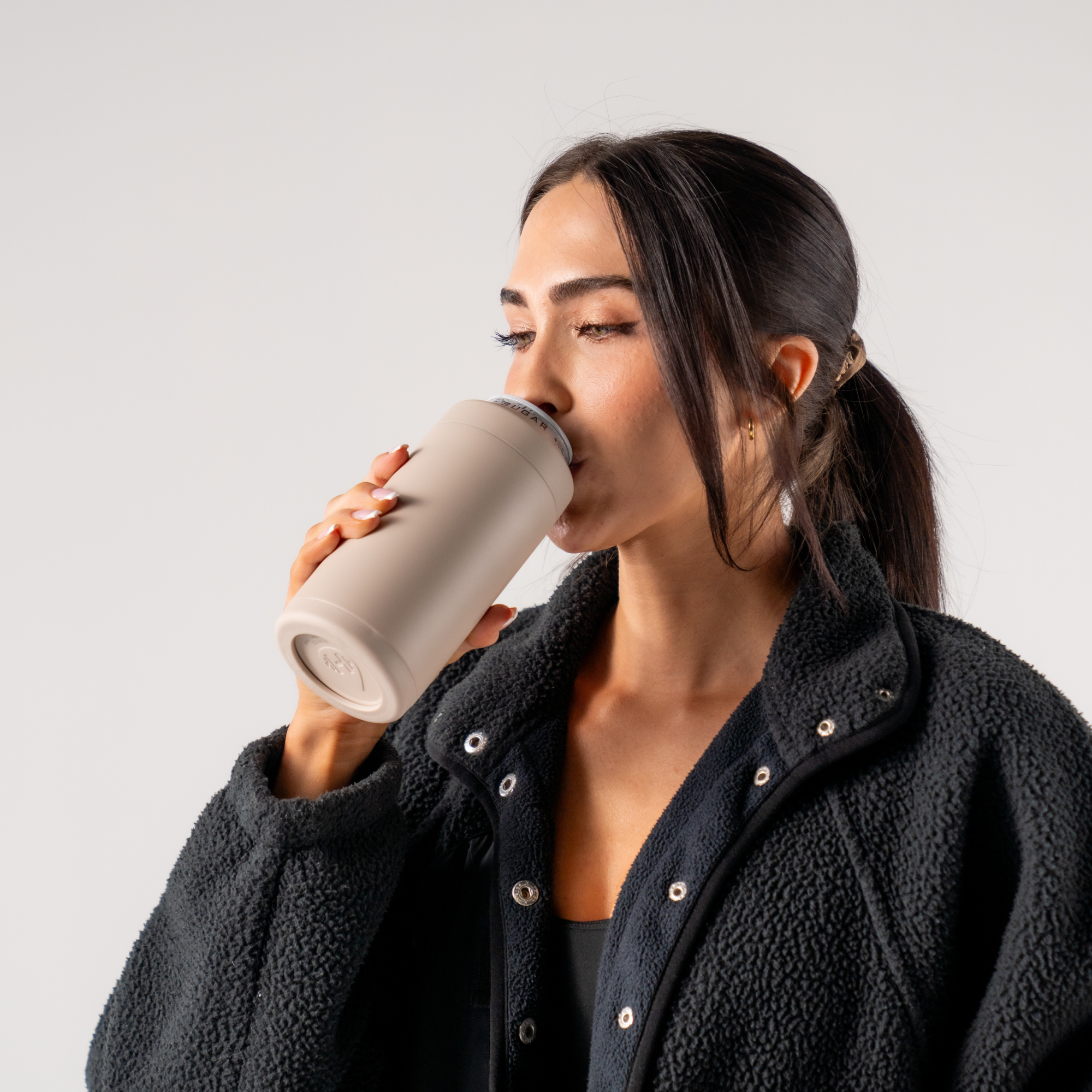 Woman Drinking from HydroJug Dune Can Cooler 16oz