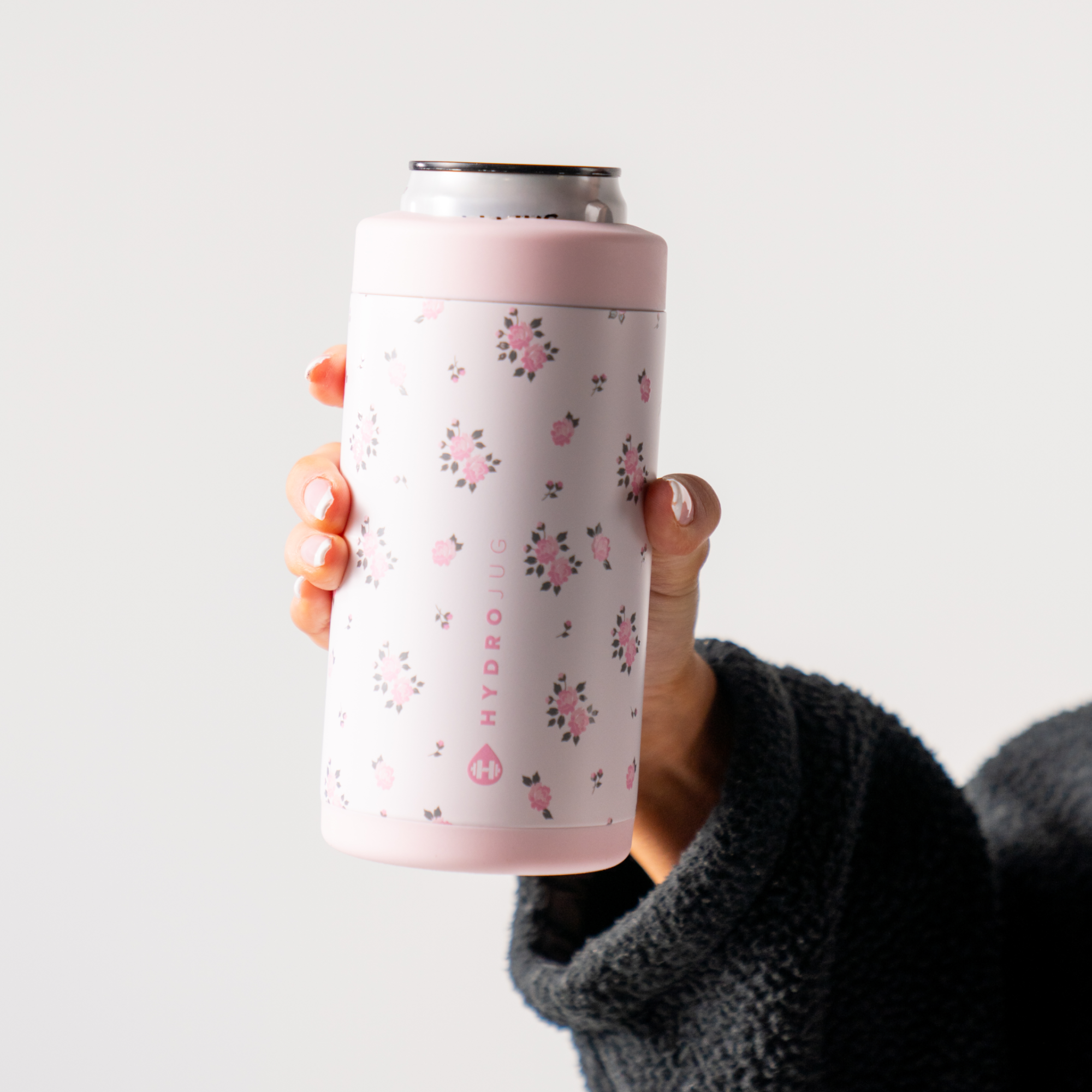 Hands Holding a HydroJug Wildrose Can Cooler 16oz