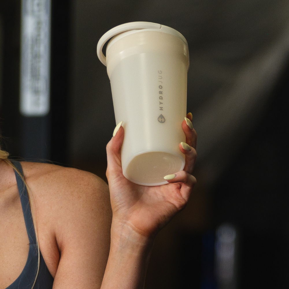 Person Holding HydroJug Cream Single Wall Shaker 20oz
