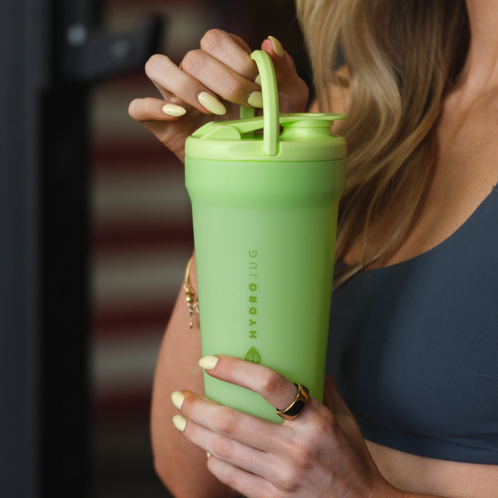 Person Holding HydroJug Honeydew Single Wall Shaker 20oz